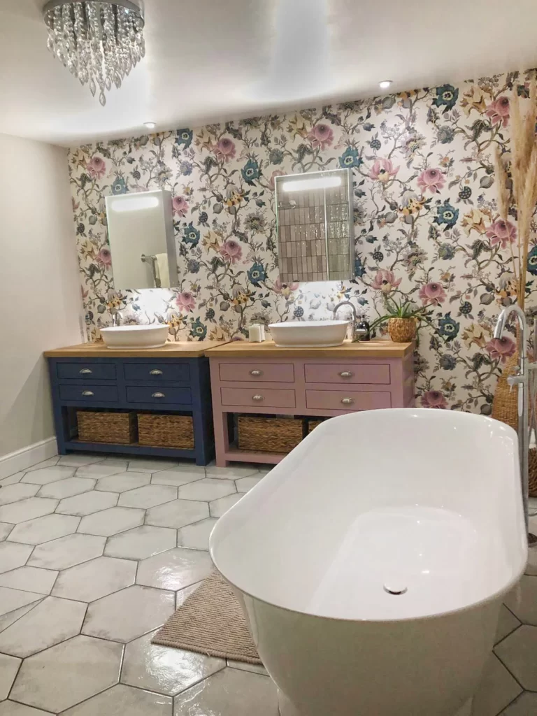 His and Hers vanity unit in blue and pink, floral wallpaper